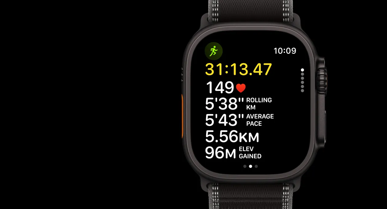 Apple Watch Ultra 3, black color, titanium case, Workout app, Outdoor Run, left side exterior, Action button, right side exterior, Digital Crown, side button, band, Trail Loop, black/charcoal color