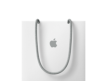 Ön tarafının ortasında Apple logosu bulunan bir taşıma çantası